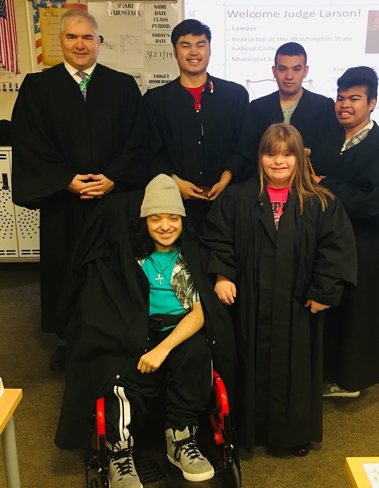 Judge Dave Larson speaking in a special needs classroom