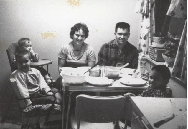 The Larson family gathered around a table